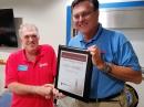 2018 McGan Award Winner E. Gordon Mooneyhan, W4EGM (left) receives the award plaque from Roanoke Division Vice Director Bill Morine, N2COP.